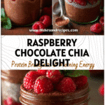 Jar of Chocolate Raspberry Chia Pudding topped with fresh mint and raspberries on a rustic table.